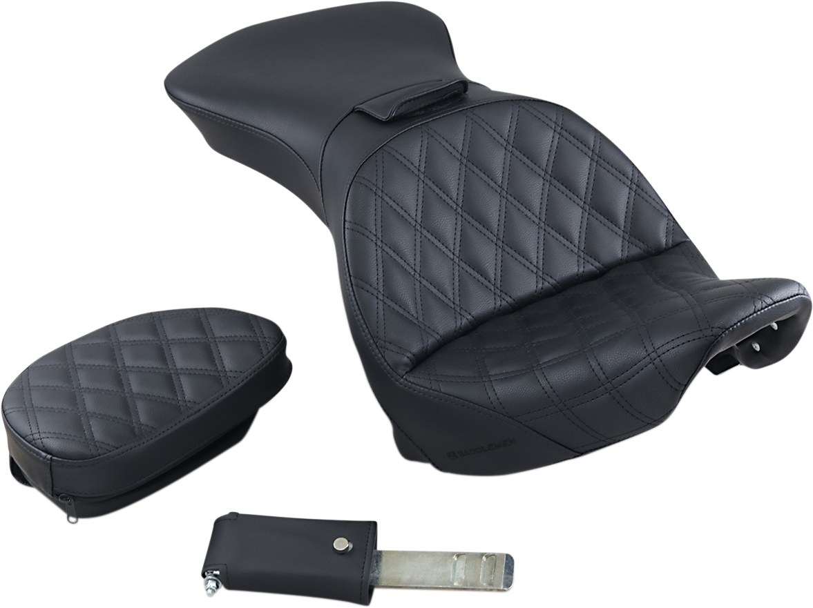 Black SADDLEMEN Explorer motorcycle seat with backrest and lattice stitching, designed for FLSTS models.