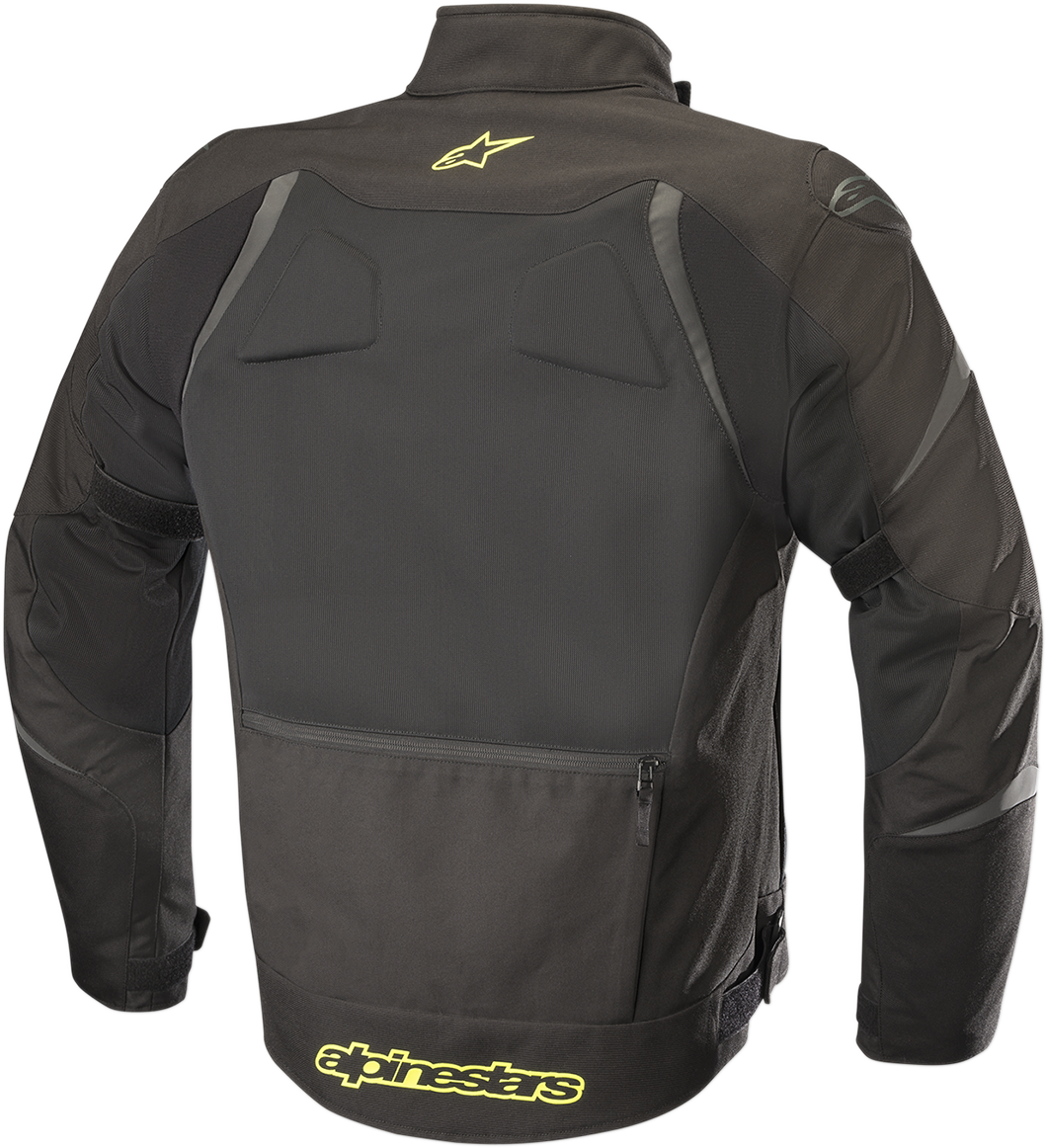 Alpinestars T-Core Drystar® motorcycle jacket in black and yellow, medium size, shown with protective design and waterproof material.