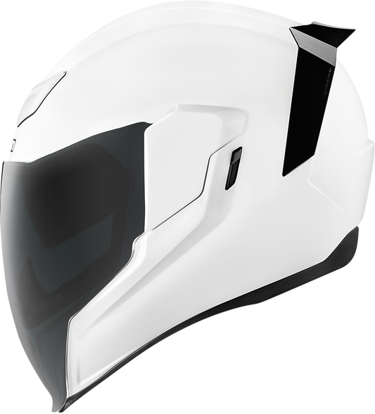 White ICON Airfliteâ„¢ helmet with gloss finish, small size, displayed with clear visibility of the helmet's sleek design.