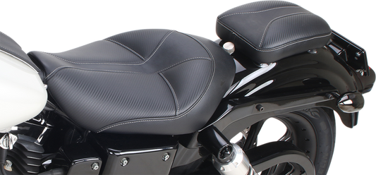 SADDLEMEN Dominator Pad 7-inch motorcycle seat showing durable black leather with detailed stitching and contoured design.