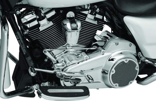 Kuryakyn Chrome Cylinder Base Cover Part 6411 on a Harley Davidson Touring motorcycle engine for a sleek, polished look.