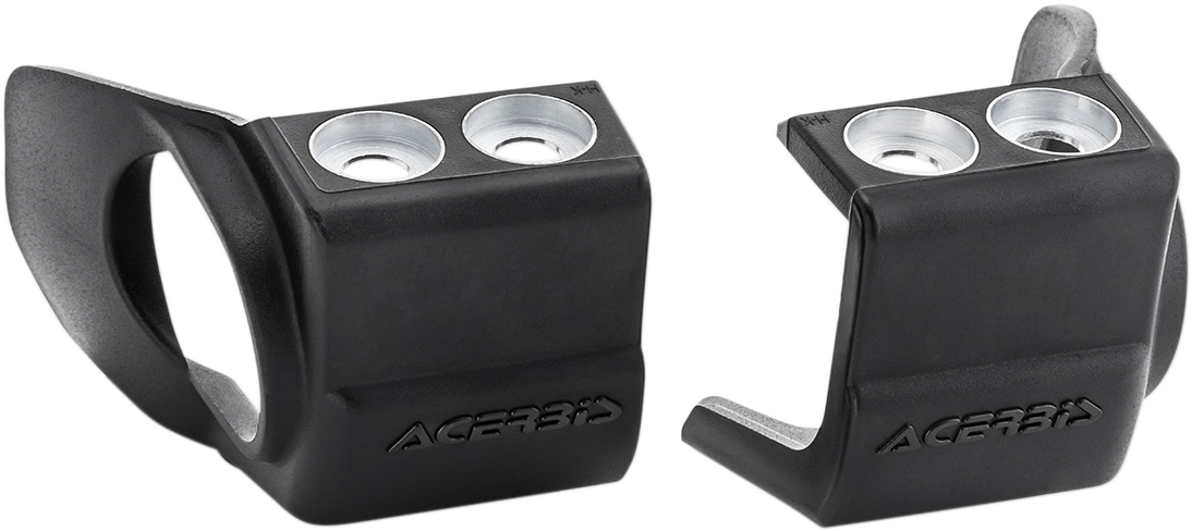 Acerbis black shoe protectors for inverted forks, designed to shield motorcycle suspension components.