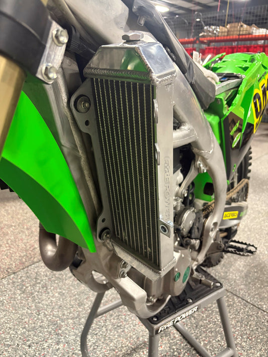 FIRE POWER TRS-R-140L radiator for Kawasaki motorcycle, high-performance aluminum cooling solution, shown from the left side