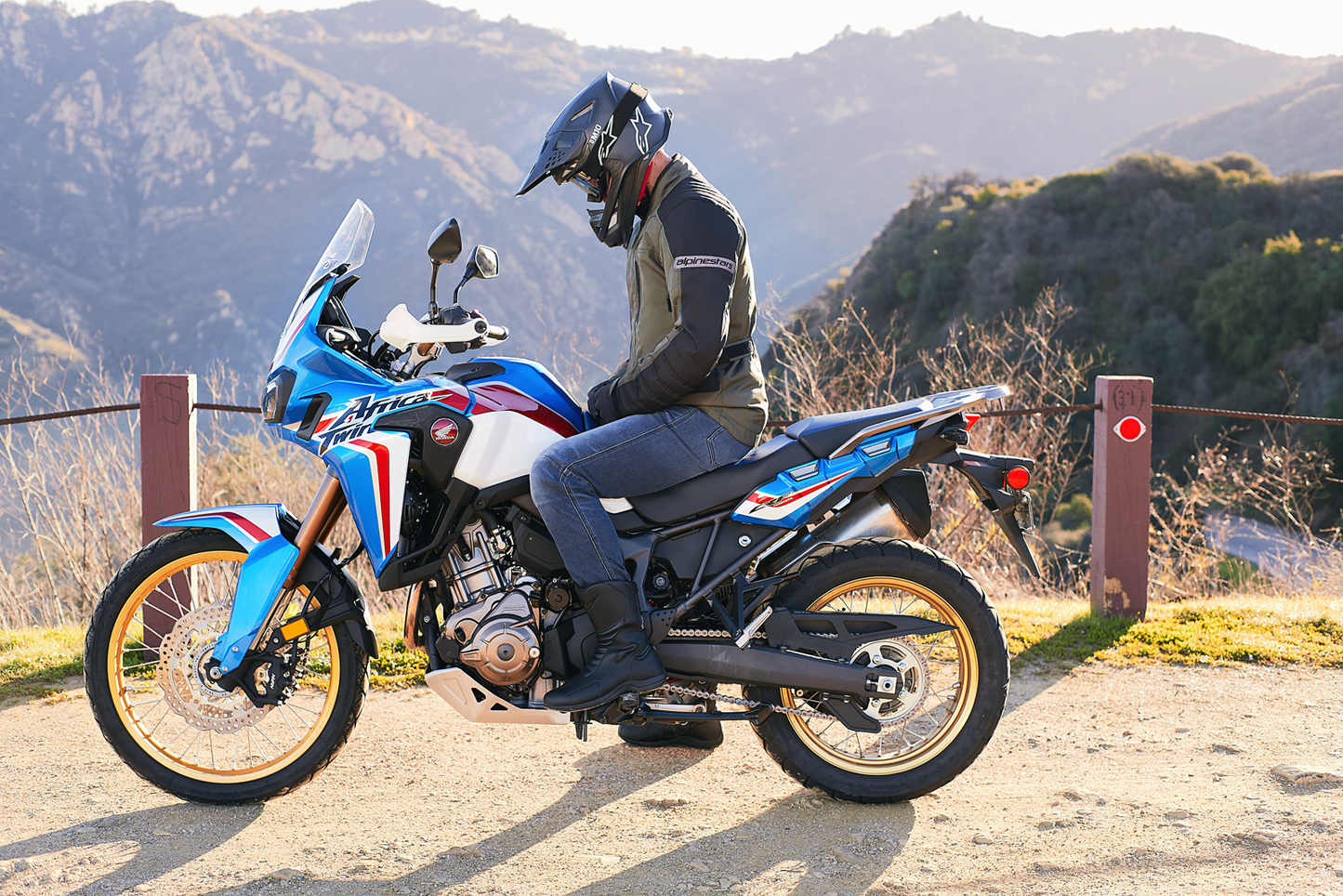 Alpinestars Gravity Drystar® motorcycle jacket in green, small size, featuring protective armor and adjustable cuffs.