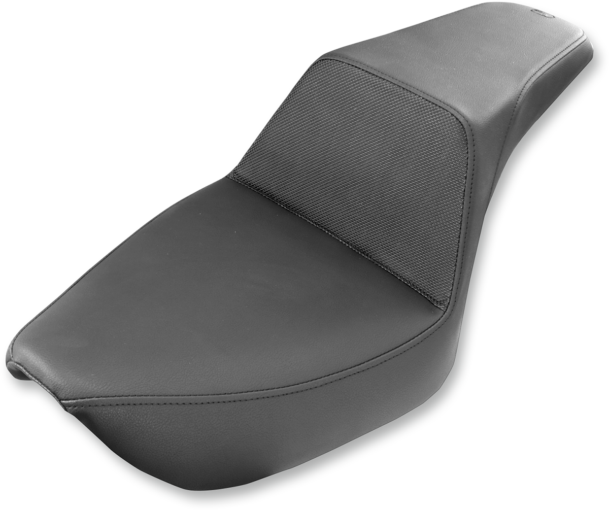 Black Saddlemens Step-Up Seat with gripper surface for FXD motorcycles, designed for comfort and style.