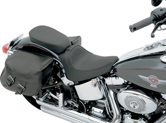 Rear solo seat by Drag Specialties for FXST/FLST motorcycles, wide design with smooth finish, model 0802-0636.