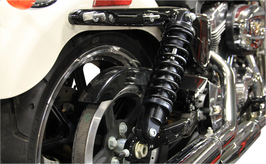 Legend Suspension REVO-A XL coil suspension in black, 12-inch adjustable suspension coil with mounting details visible.