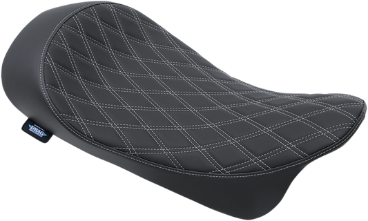 Drag Specialties low solo seat with double diamond silver stitching for Harley FL 2008-2023 motorcycle, shown from the side.