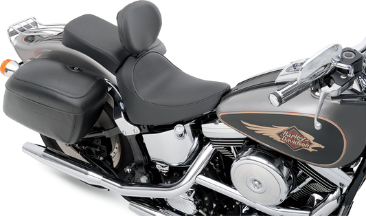 Drag Specialties solo motorcycle seat with driver backrest for FXST/FLST 1984-1999, smooth finish and cooler surface.
