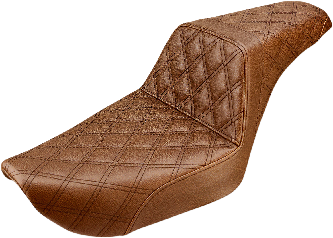 Brown Saddlemens Step-Up Seat with full lattice stitch for Dyna motorcycles, featuring a durable leather finish and ergonomic design.