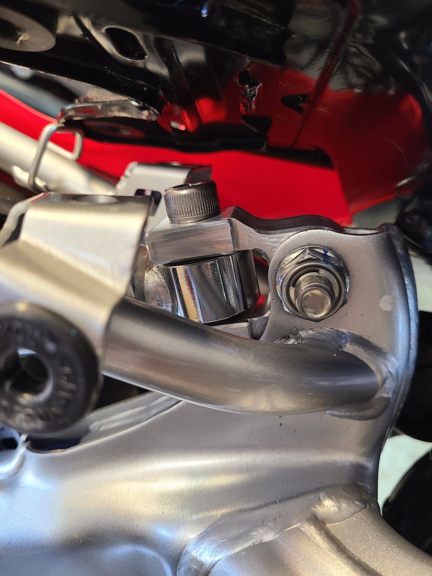 CRF110 REAR SHOCK EXTENDER - Howling Moto