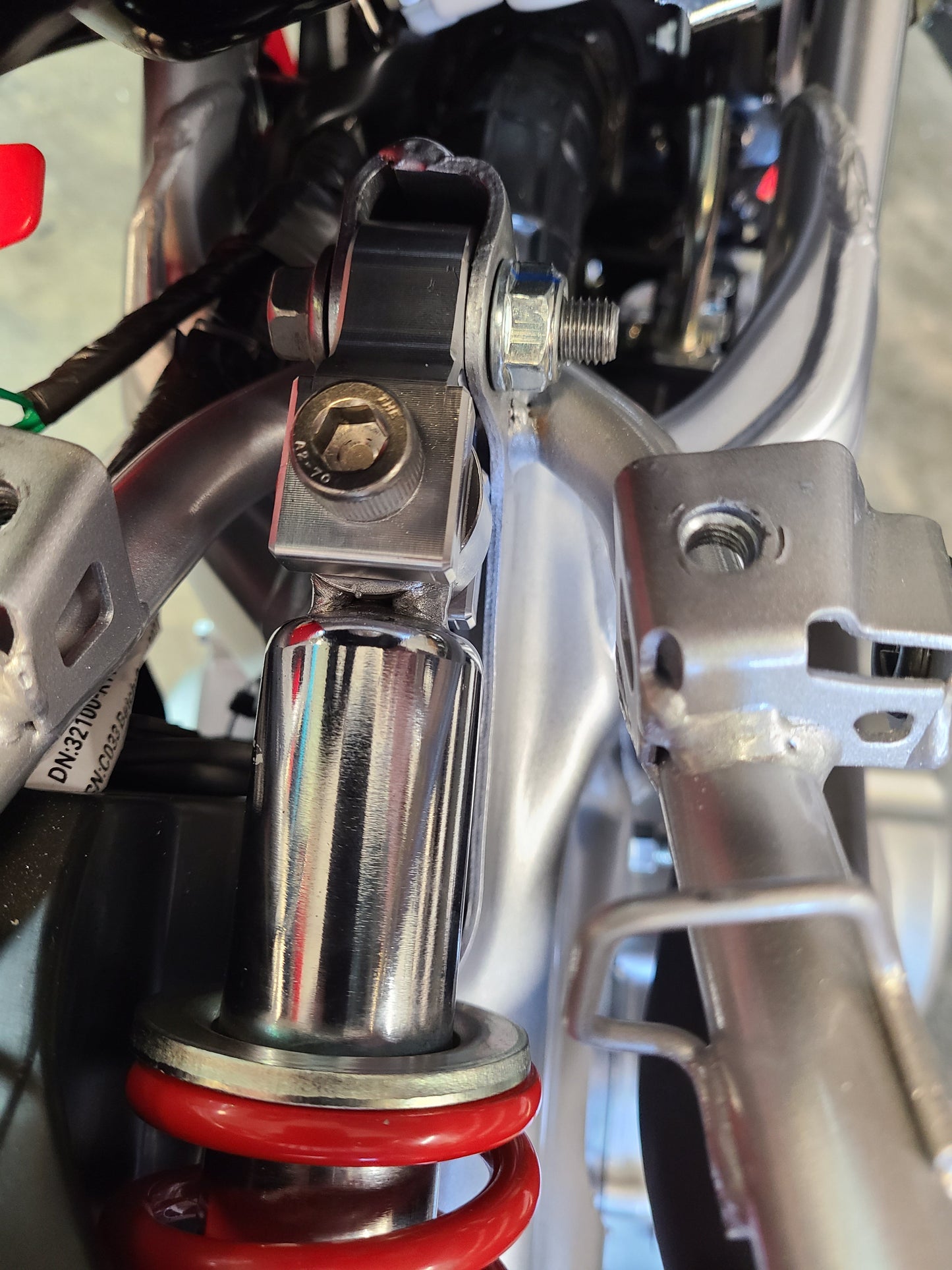 CRF110 REAR SHOCK EXTENDER - Howling Moto