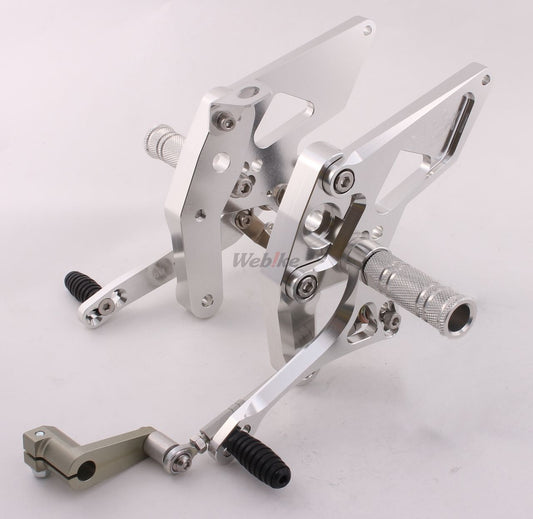 Over Racing rearsets with 4 adjustable positions for Honda Grom motorcycle, shown installed on the bike.