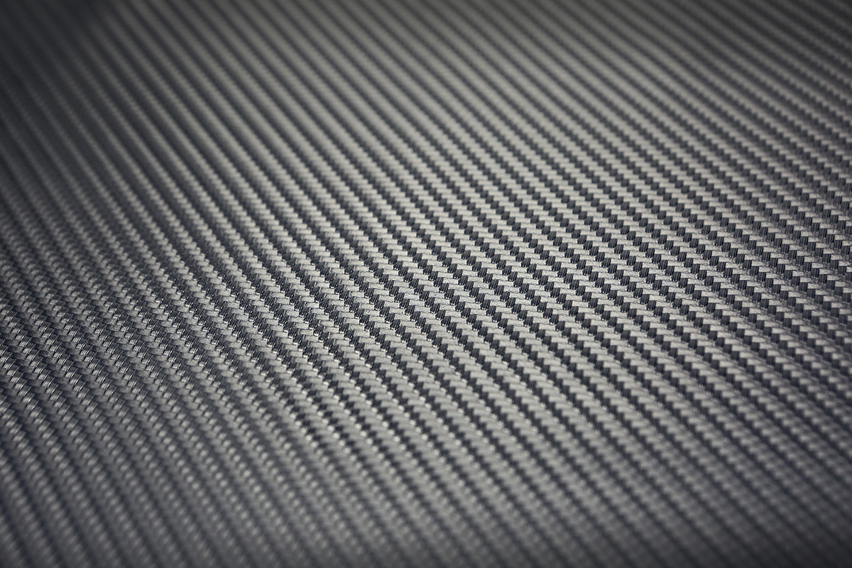 Bill's Exhausts SADDLEMEN Carbon Seat Cover for seats, featuring a sleek black carbon fiber design and precise 54x36 inch fit.