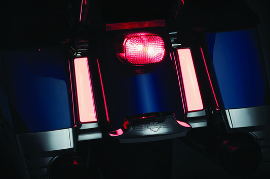 Kuryakyn Tracer LED inserts for saddlebag supports in chrome with red auxiliary lighting for Harley Davidson touring bikes.