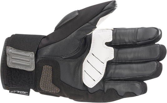 Alpinestars Corozal V2 Drystar gloves in black, white, and dark gray, XL size, showing protective design and textured surface.