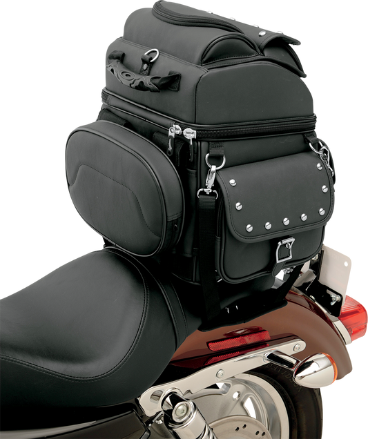 Bill's Exhausts SADDLEMEN sissy bar bag mounted on motorcycle seat, durable storage with adjustable straps and sleek design.