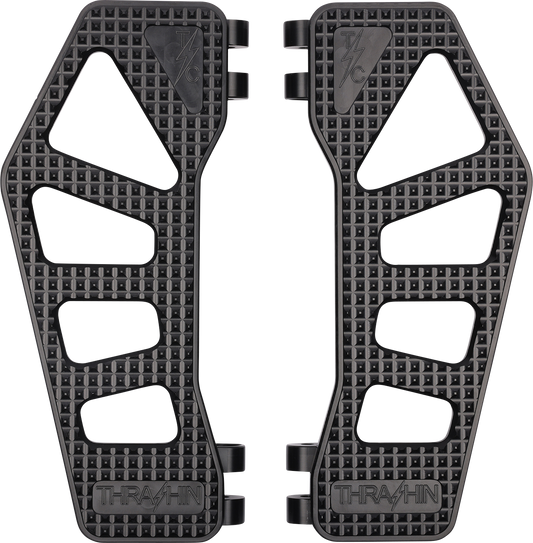 Black THRASHIN SUPPLY CO. Apex floorboards for Harley-Davidson motorcycle, featuring durable design and textured surface.