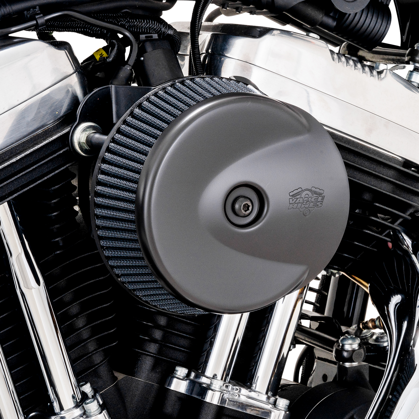 Vance & Hines VO2 Stingray air intake kit in matte black installed on a classic V-twin engine motorcycle.