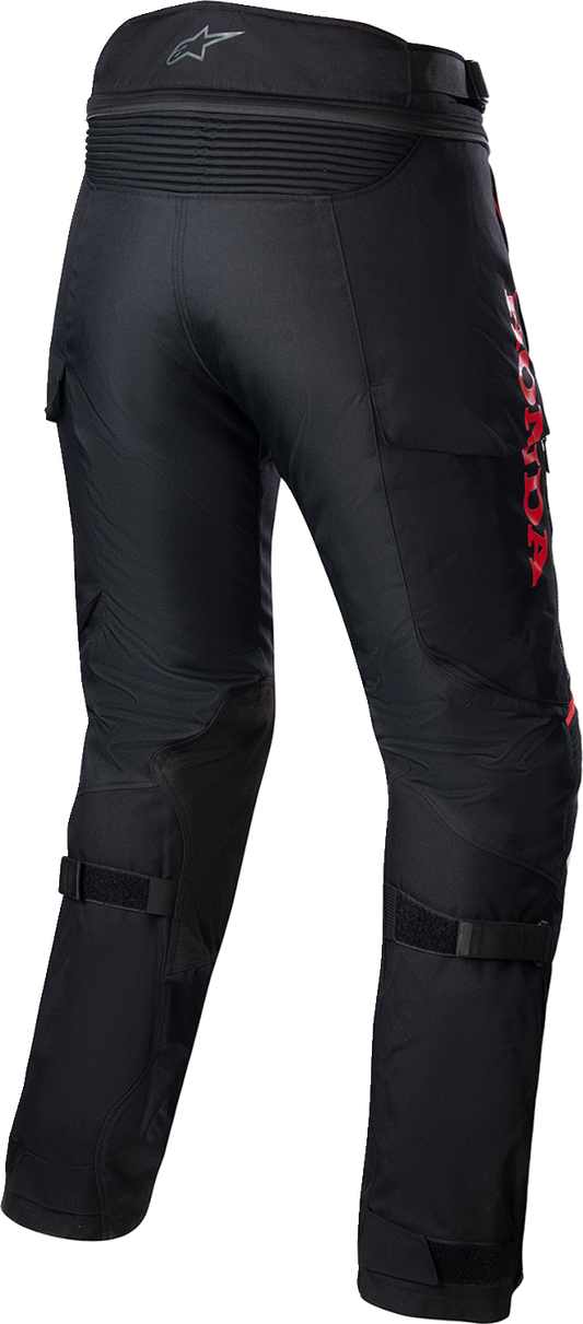 Alpinestars Honda Bogotá Pro Drystar motorcycle pants in black and red, large size, with protective knee padding and waterproof material.