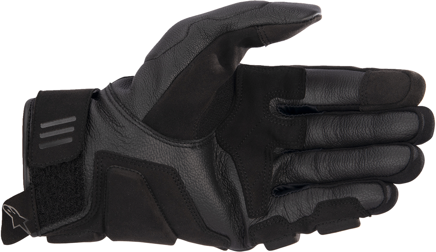 Alpinestars Phenom motorcycle gloves in black and black, medium size, showing the padded finger and palm protection.