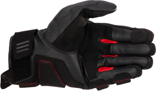 Alpinestars Phenom gloves in black and bright red, size large, showing the protective design and textured palms.