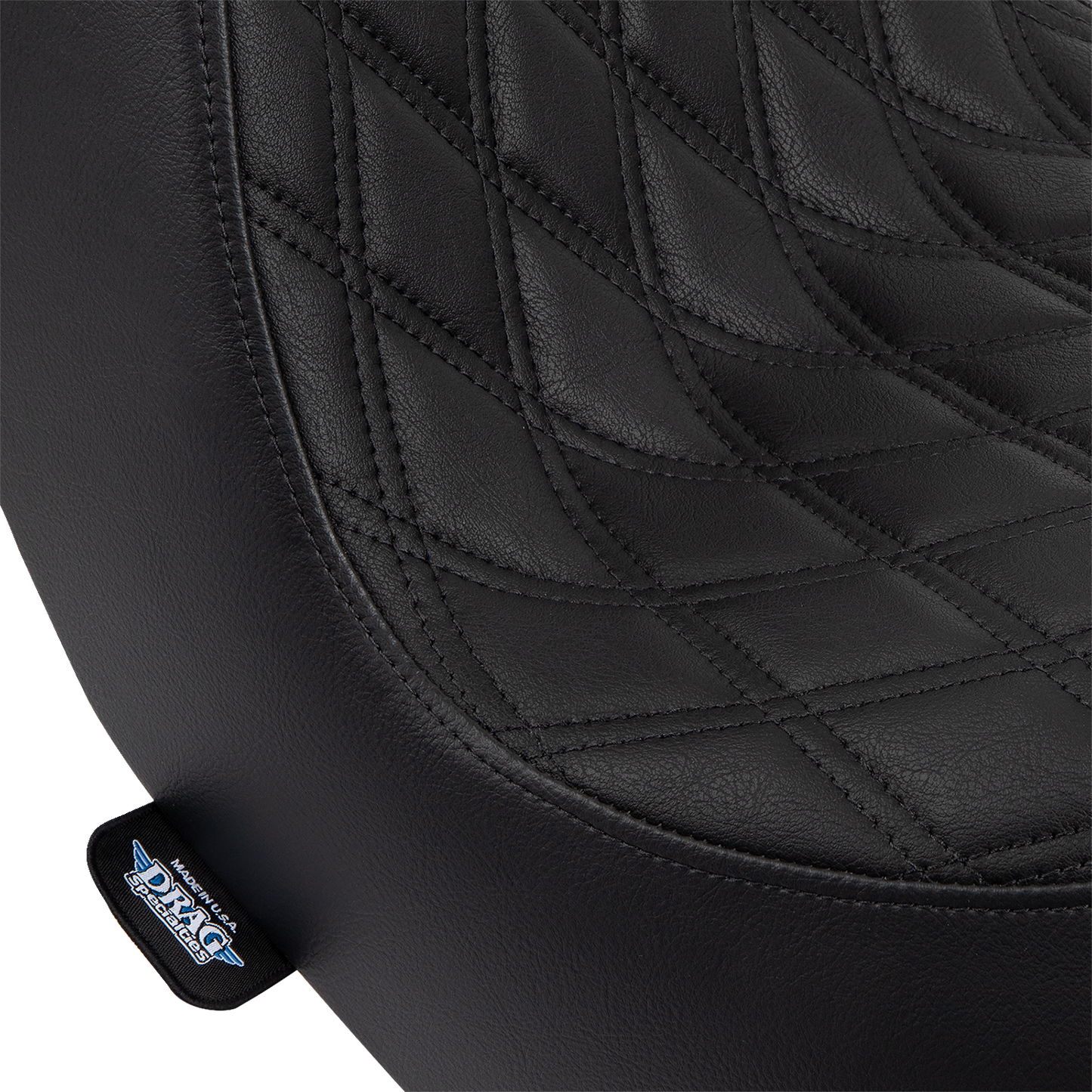 Drag Specialties Predator III 2-up seat for FL/FX motorcycles, black vinyl with double diamond pattern and black stitching.
