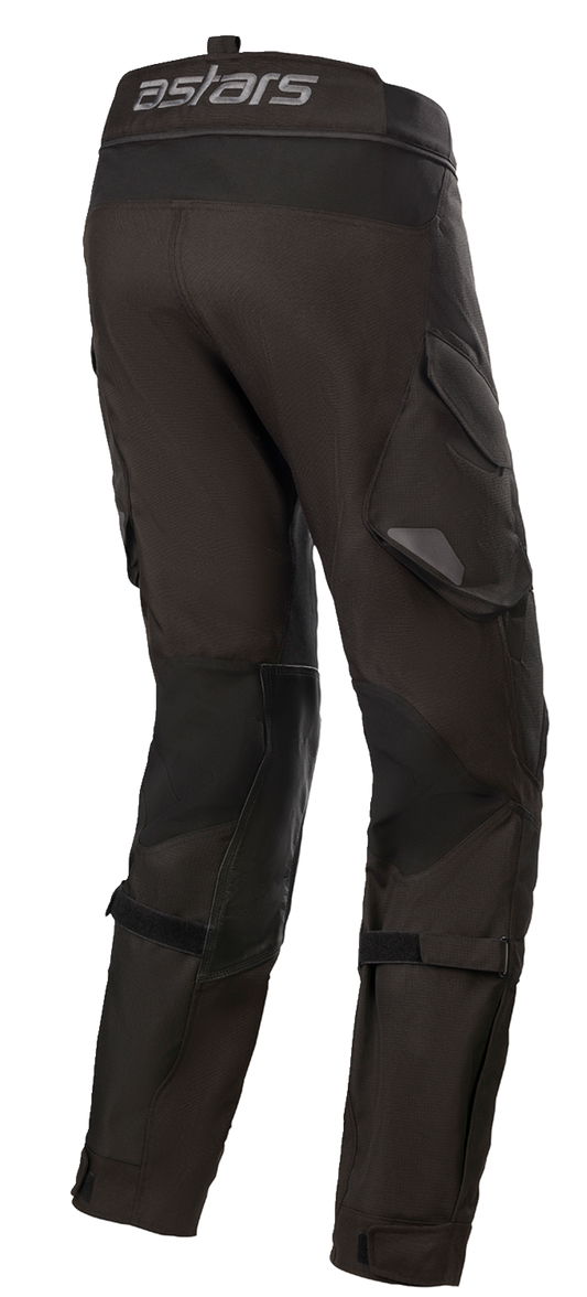 Alpinestars Halo Drystar waterproof motorcycle pants in black, size XL, with protective knee padding and adjustable waist.