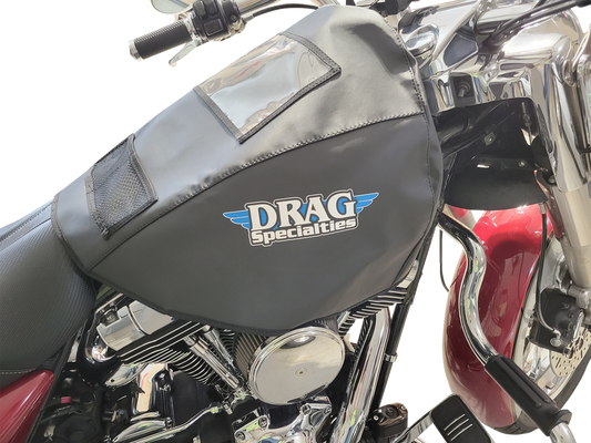 DRAG SPECIALTIES fuel tank service cover for Dyna, Softail, Touring, and Trike motorcycle models, black metal finish.