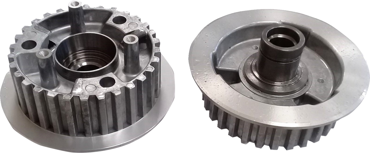 DRAG SPECIALTIES clutch hub for touring and trike models, showing the metal component with detailed machining and mounting points.