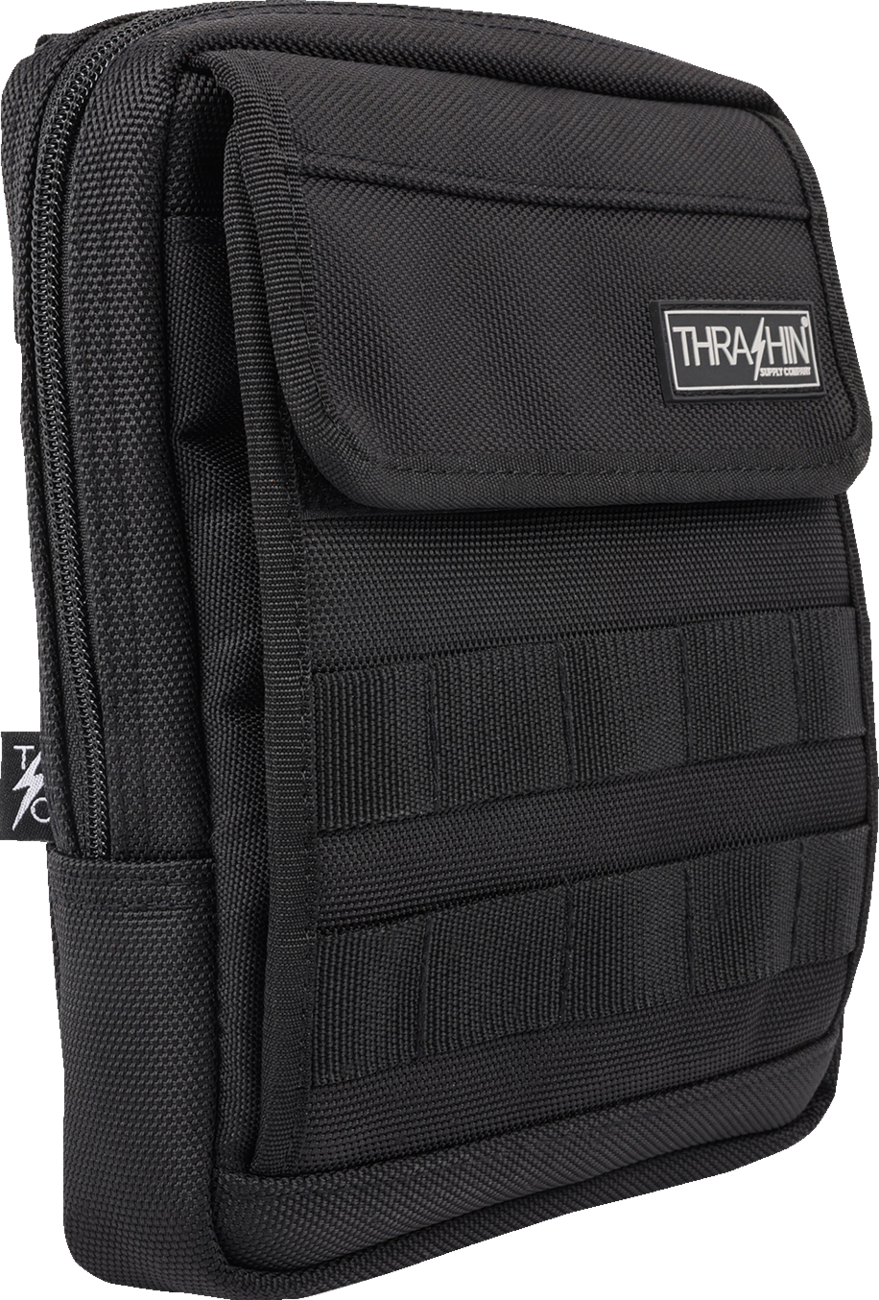 Black THRASHIN SUPPLY CO. Slim Handlebar Bag attached to a bicycle handlebar for storage and easy access.