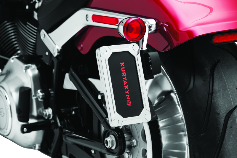 Kuryakyn Nova side mount license plate frame in glossy chrome for Harley Davidson motorcycles.