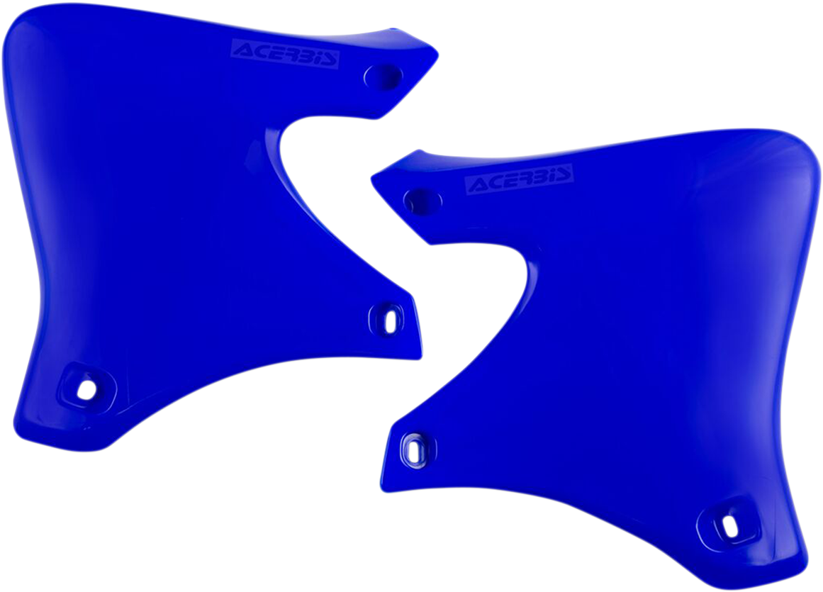 Blue Acerbis radiator shrouds for motorcycle body protection, designed by Bill's Exhausts, shown in a detailed 2D illustration.