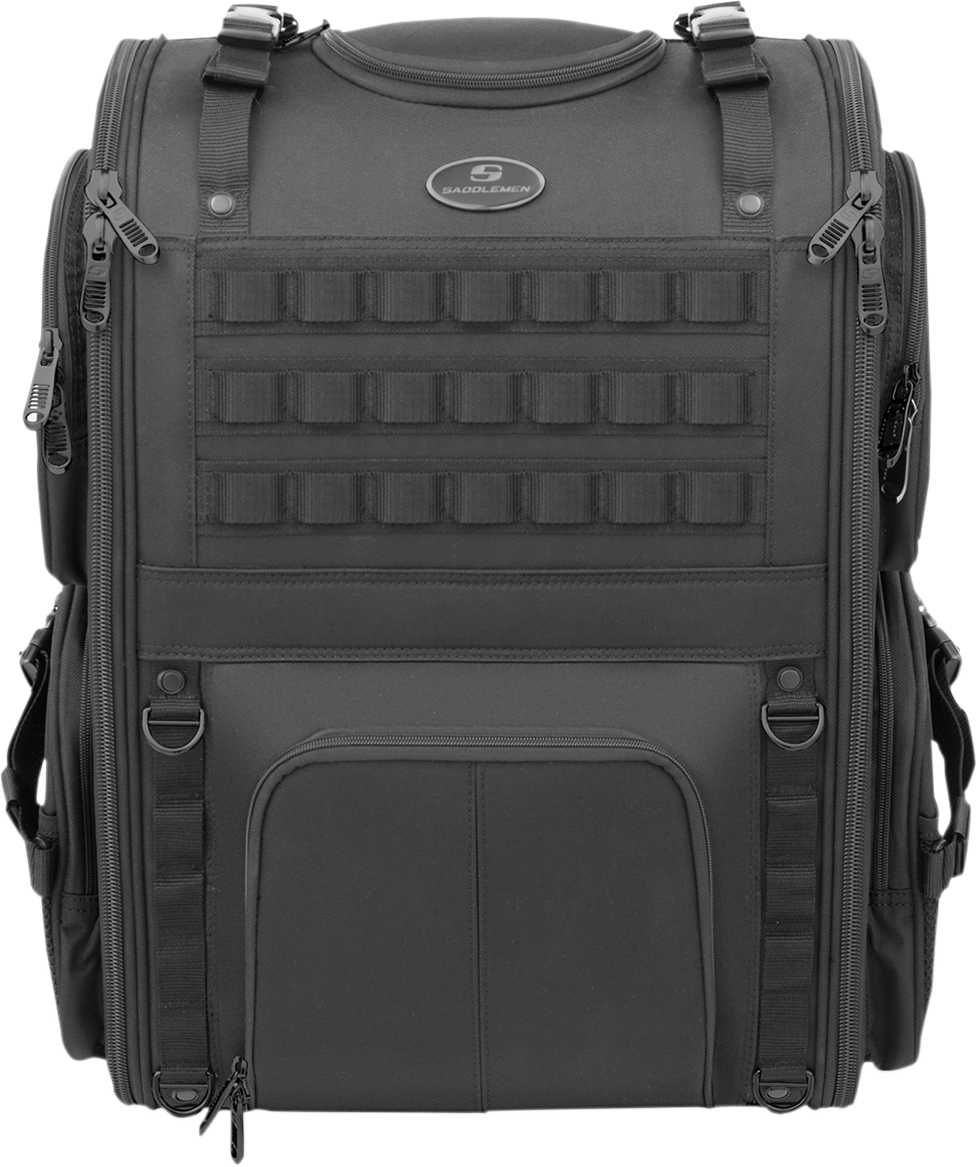 Bill's Exhausts SADDLEMEN S3500 tactical sissy bar bag attached to motorcycle seat, featuring durable material and secure straps.