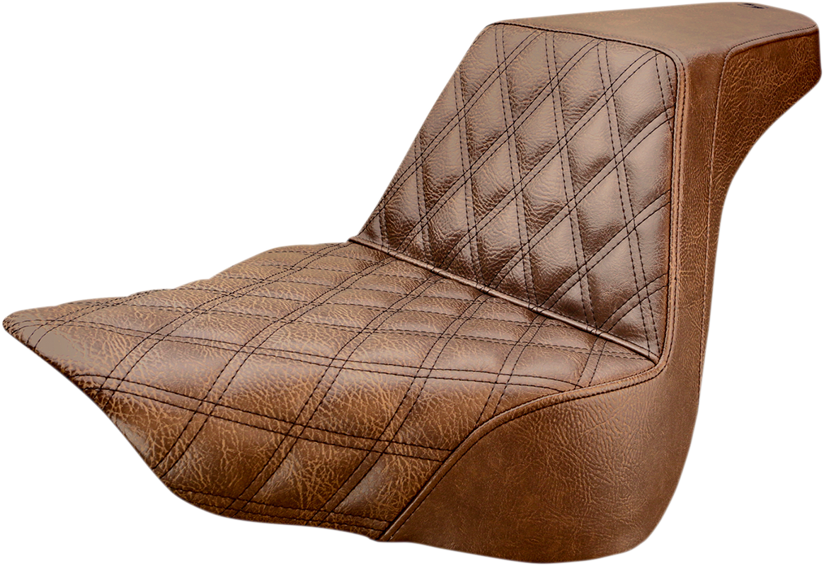 Brown SADDLEMEN Step-Up Seat with front lattice stitch for bikes, featuring a durable design and stylish stitching.