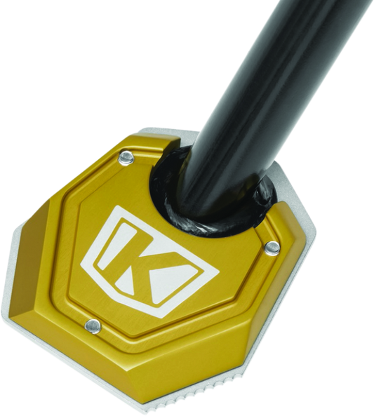 Kuryakyn Lodestar Kickstand Shoe for BMW R1200GS with tire bead breaking tool, enhancing stability and ease of bike maintenance