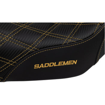 Pro Series SDC performance motorcycle seat by Saddlemens with carbon fiber finish, lumbar gripper, and gold stitching on a Dyna bike.