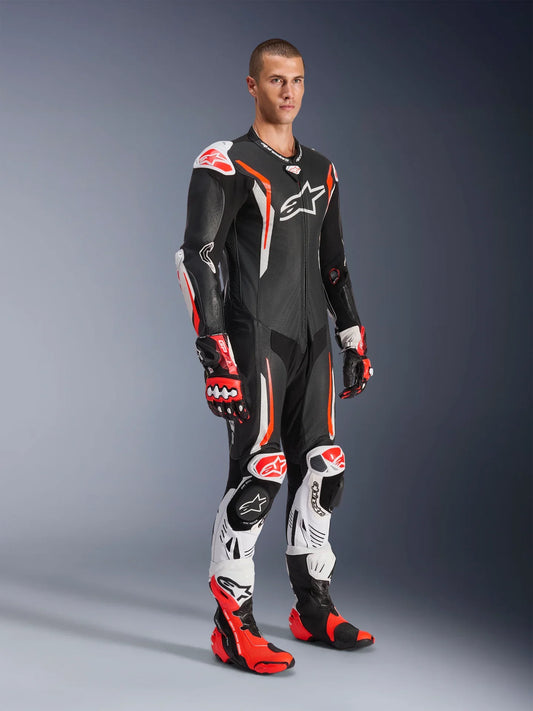 Alpinestars GP Tech V5 1-piece leather suit in black, white, and red fluo, US 46 / EU 56, designed for motorcycle racing.