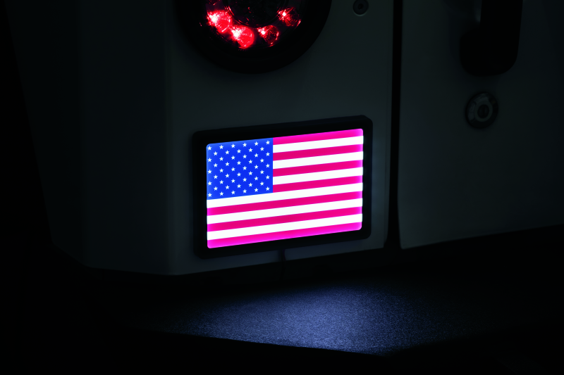 Black Kuryakyn Freedom Flag LED light for 4x6 inch powersports vehicles, featuring vibrant LED illumination and durable design.