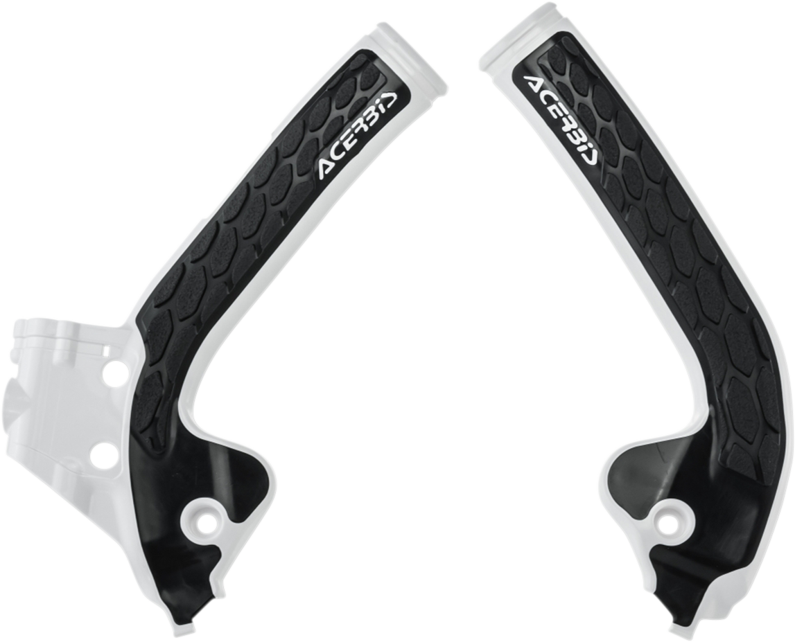 Acerbis X-Grip frame guards in white and black installed on a motorcycle frame, providing protection and style.