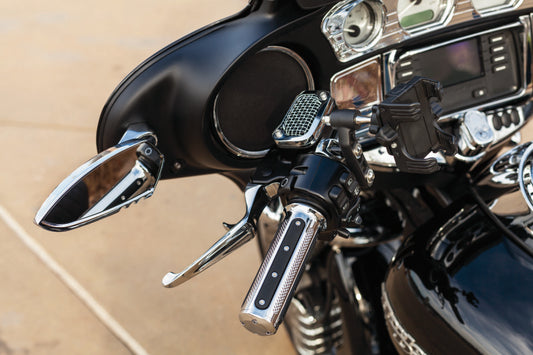 Kuryakyn Heavy Industry Chrome Grips with throttle-by-wire for powersports motorcycles, showing textured grip surface and chrome finish.