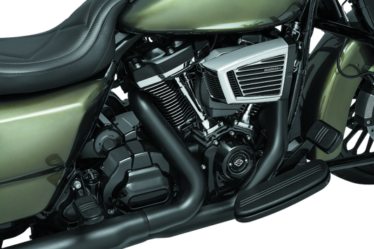 Black Kuryakyn Precision Transmission Top Cover for Harley-Davidson motorcycle, showcasing a sleek, durable metal finish.