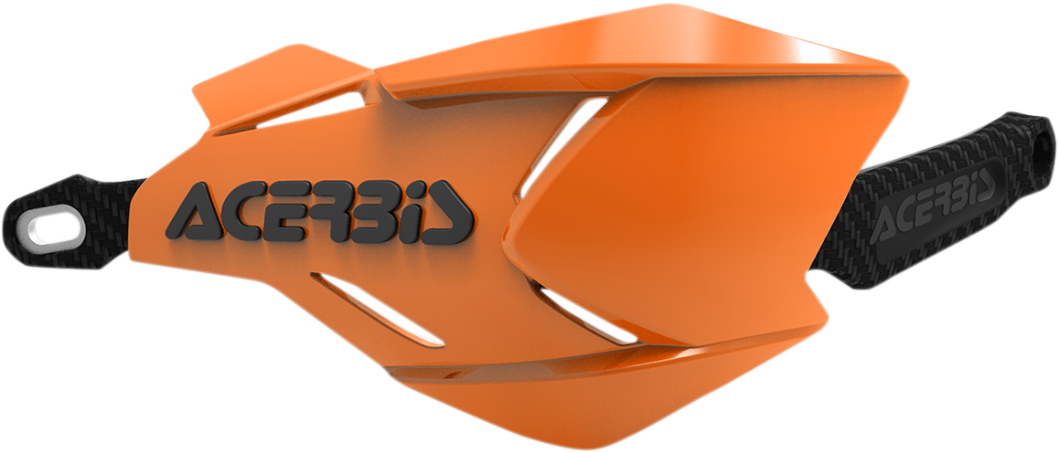 A pair of ACERBIS X-Factory handguards in orange and black mounted on motorcycle handlebars.