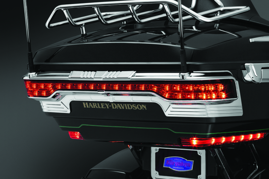 Kuryakyn Tri-Line Accent for Rear Tour-Pak Light in chrome on Harley-Davidson FLTRXS motorcycle with illuminated rear light