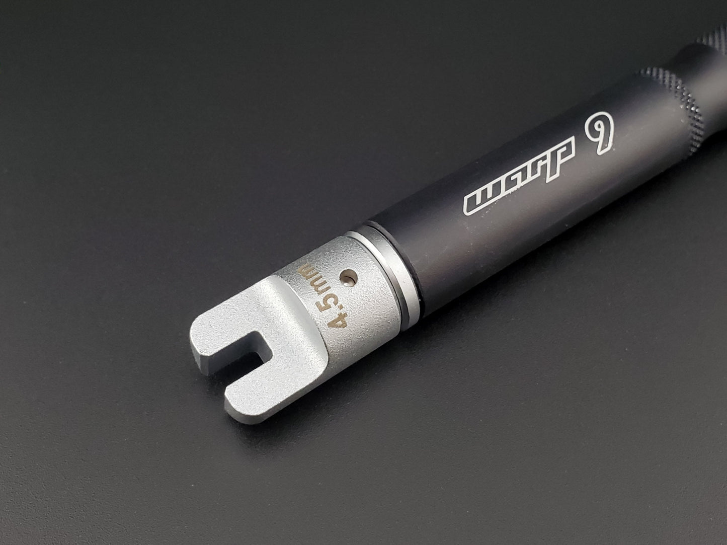 Warp9Racing 4.5mm spoke wrench tip for bicycle wheel adjustments, shown with a close-up of the tool tip.