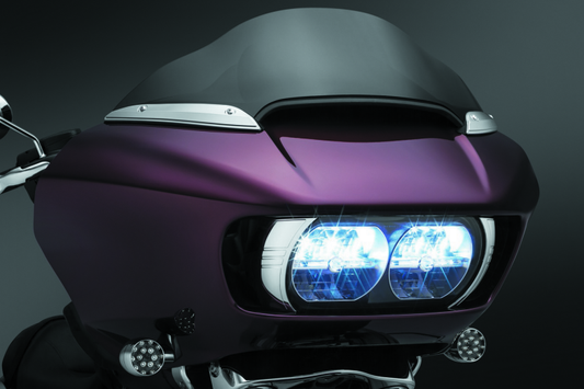 Chrome Kuryakyn windshield side trims for Harley-Davidson Road Glide 2015-2021, shown mounted on the fairing.
