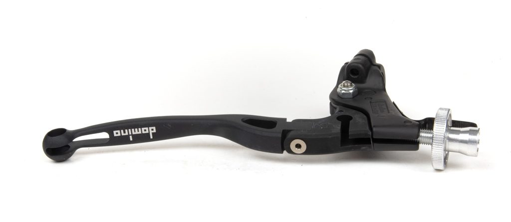 Domino MotoGP foldable clutch lever assembly made of forged aluminum, weighing 145g, shown on a motorcycle handlebar.