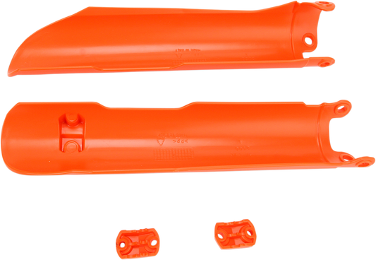 A close-up of ACERBIS KTM orange lower fork covers for inverted forks, designed for off-road motorcycle suspension protection.