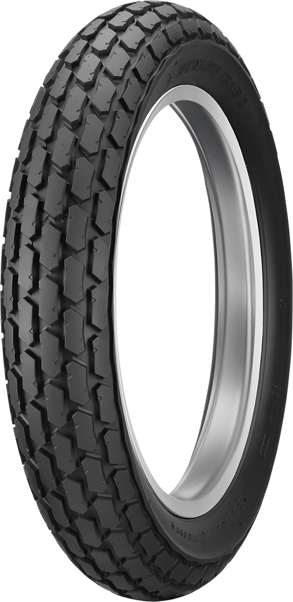 DUNLOP K180 rear motorcycle tire, 130/90-10 61J size, designed for custom style bikes, with tread pattern visible in the image.