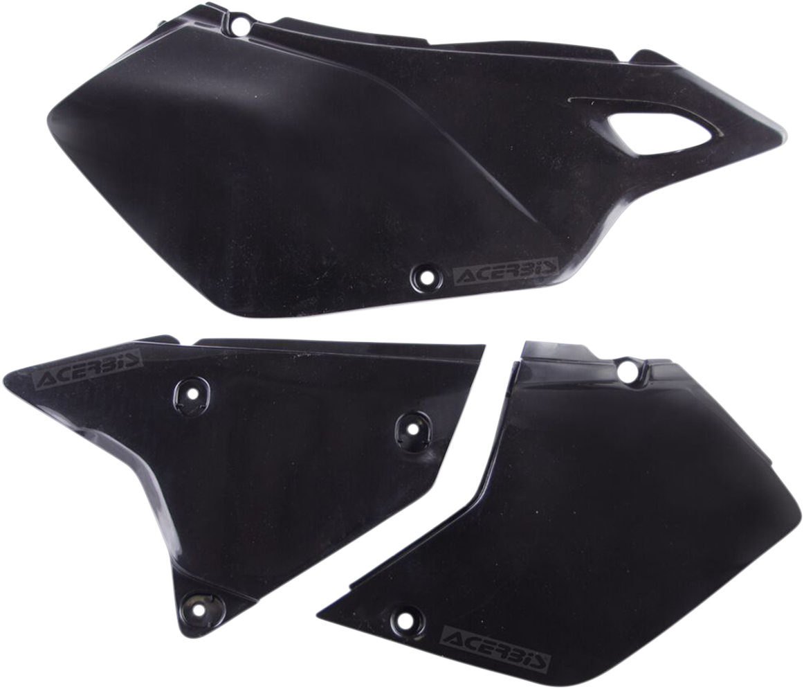 Black Acerbis side panels for motorcycle body, designed for durability and fit, shown on a vehicle in the image.